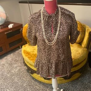 Joie silk leopard print blouse with flounce.
